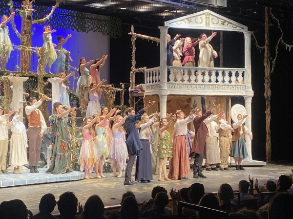 On opening night, the actors thank the tech crew. After their own bows, the actors raise their hands to the light and sound crew.